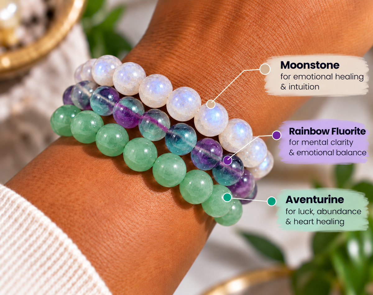 Cancer crystal bracelet stack worn on the wrist for emotional healing and intuition.