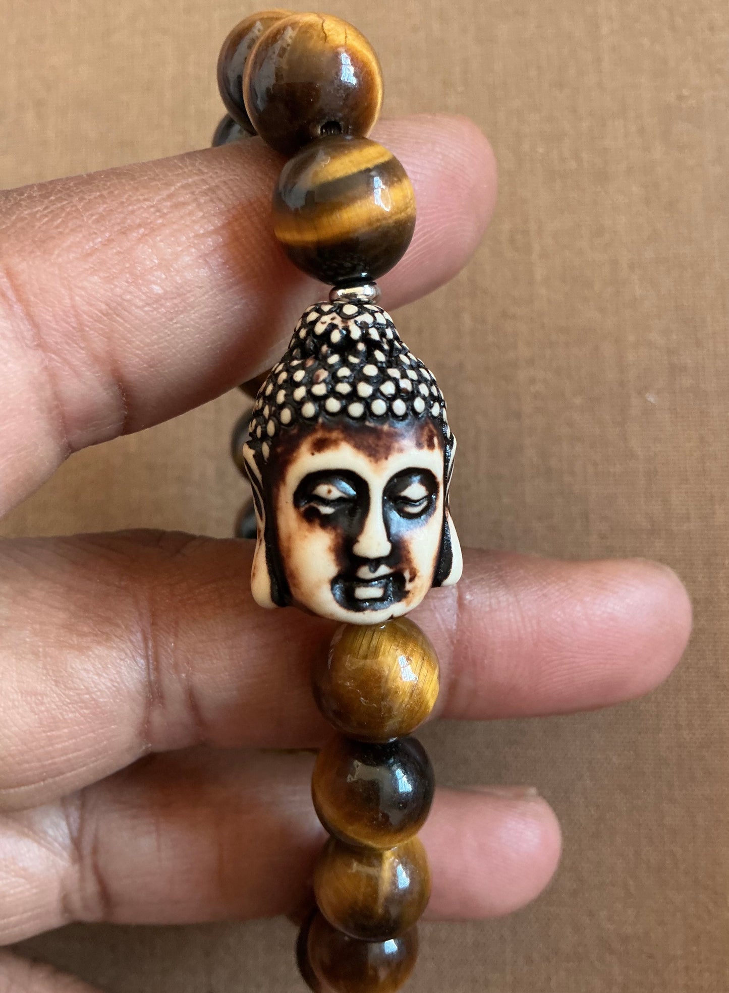 Tiger’s Eye Bracelet with Double sided Carved Buddha