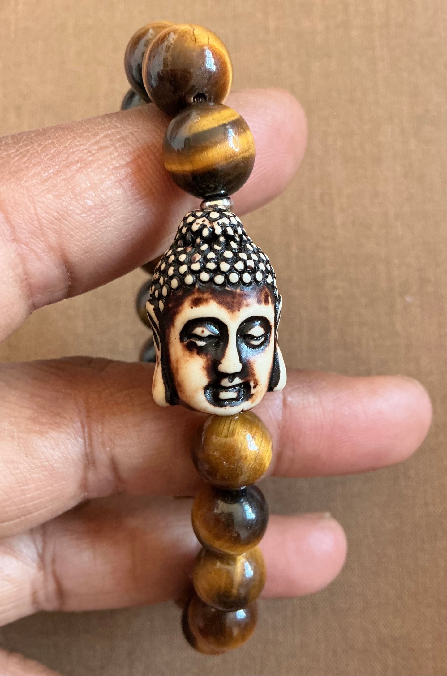 Tiger’s Eye Bracelet with Double sided Carved Buddha