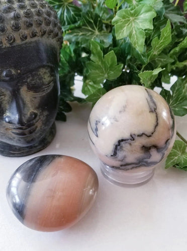 Pink Zebra Calcite Crystal Sphere & Palm Stone Set